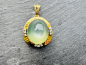 Preview: Hochwertiger Goldanhänger in 750er Gelbgold mit grünen Cabochon (Mondstein Durchmesser ca 20mm) und 9 Brillanten ca. 0,90 ct, ca.27,10g gesamt, (35)